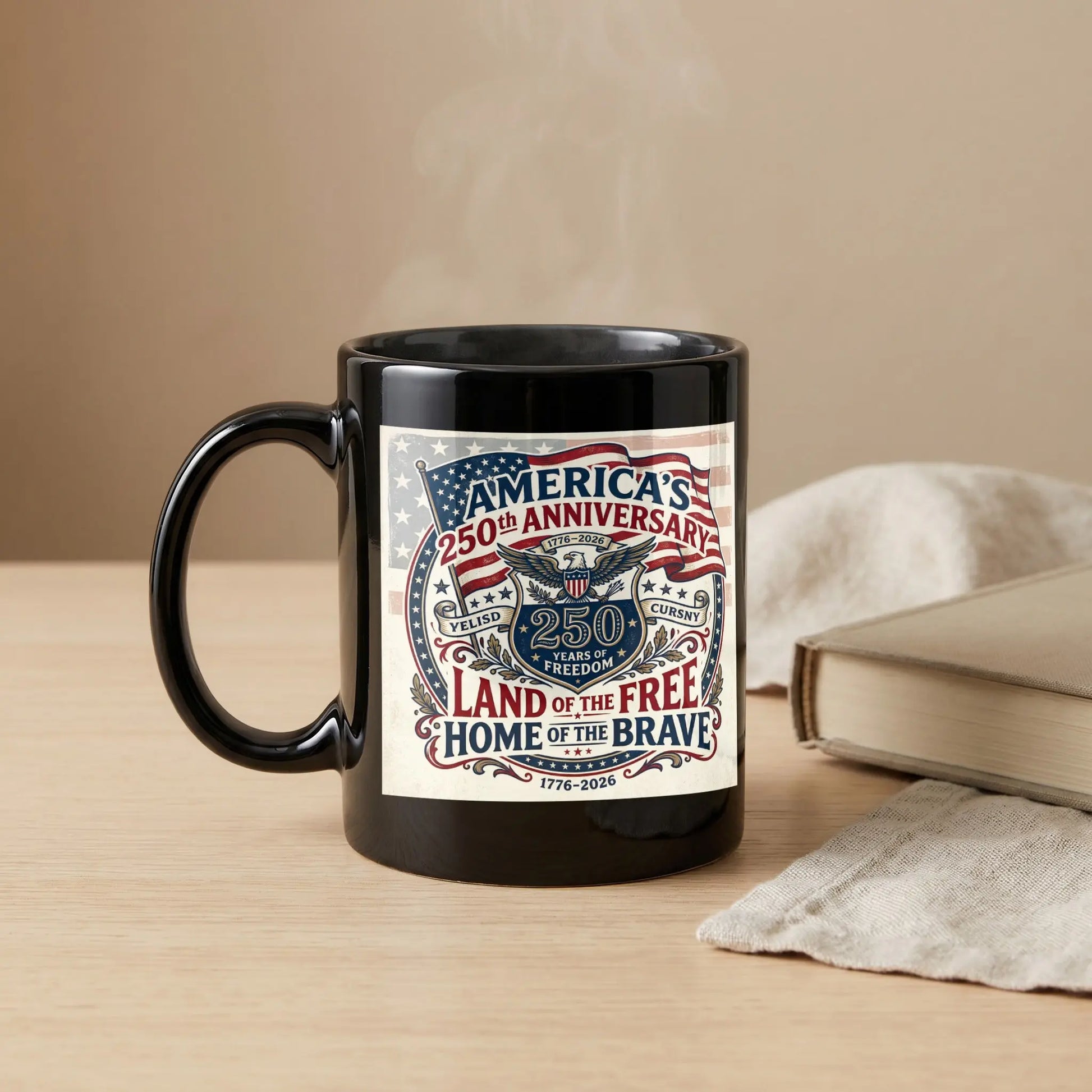Black mug with designs celebrating America's 250th anniversary and "I am the land of the free".