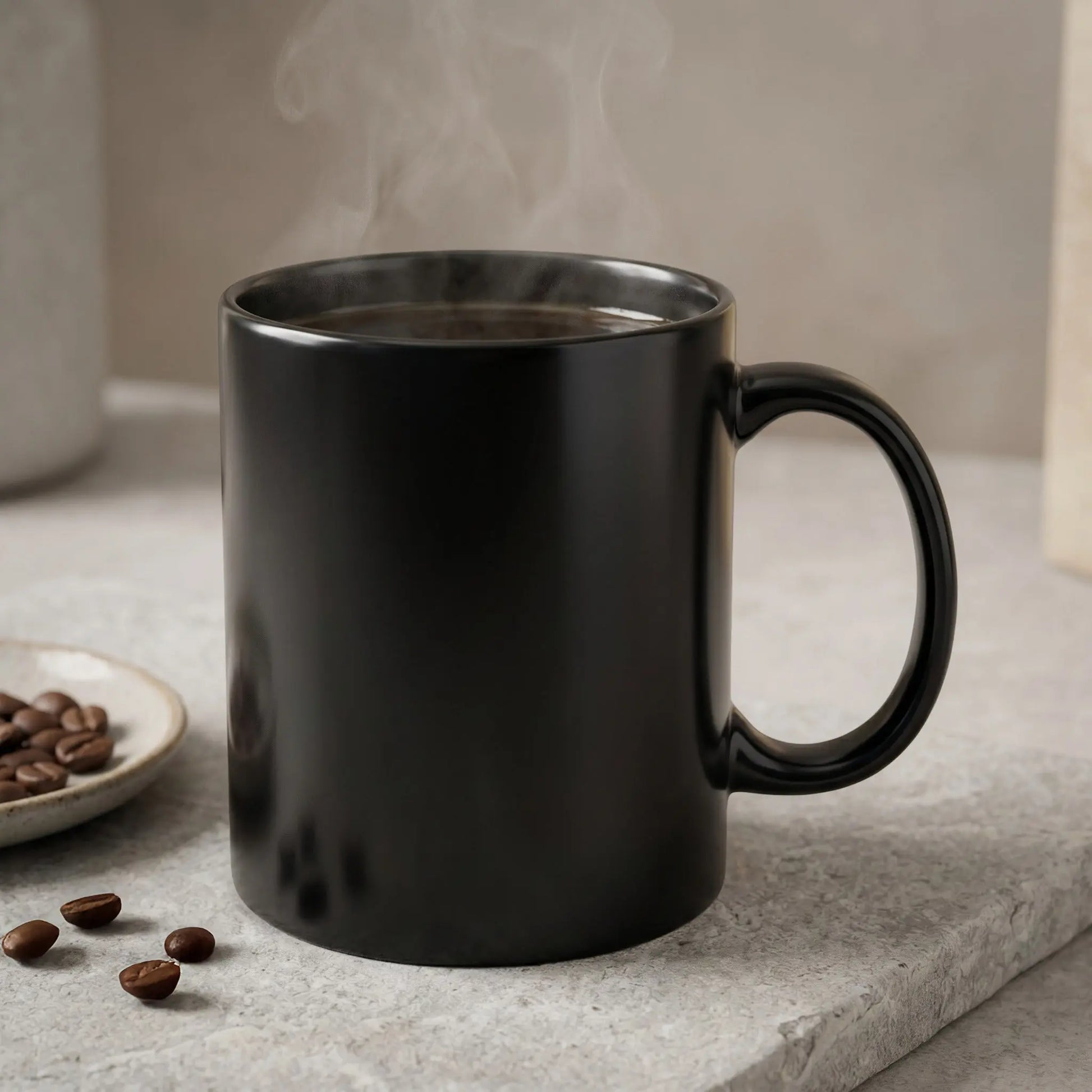 Steaming black coffee in a black mug on a stone surface with scattered coffee beans.