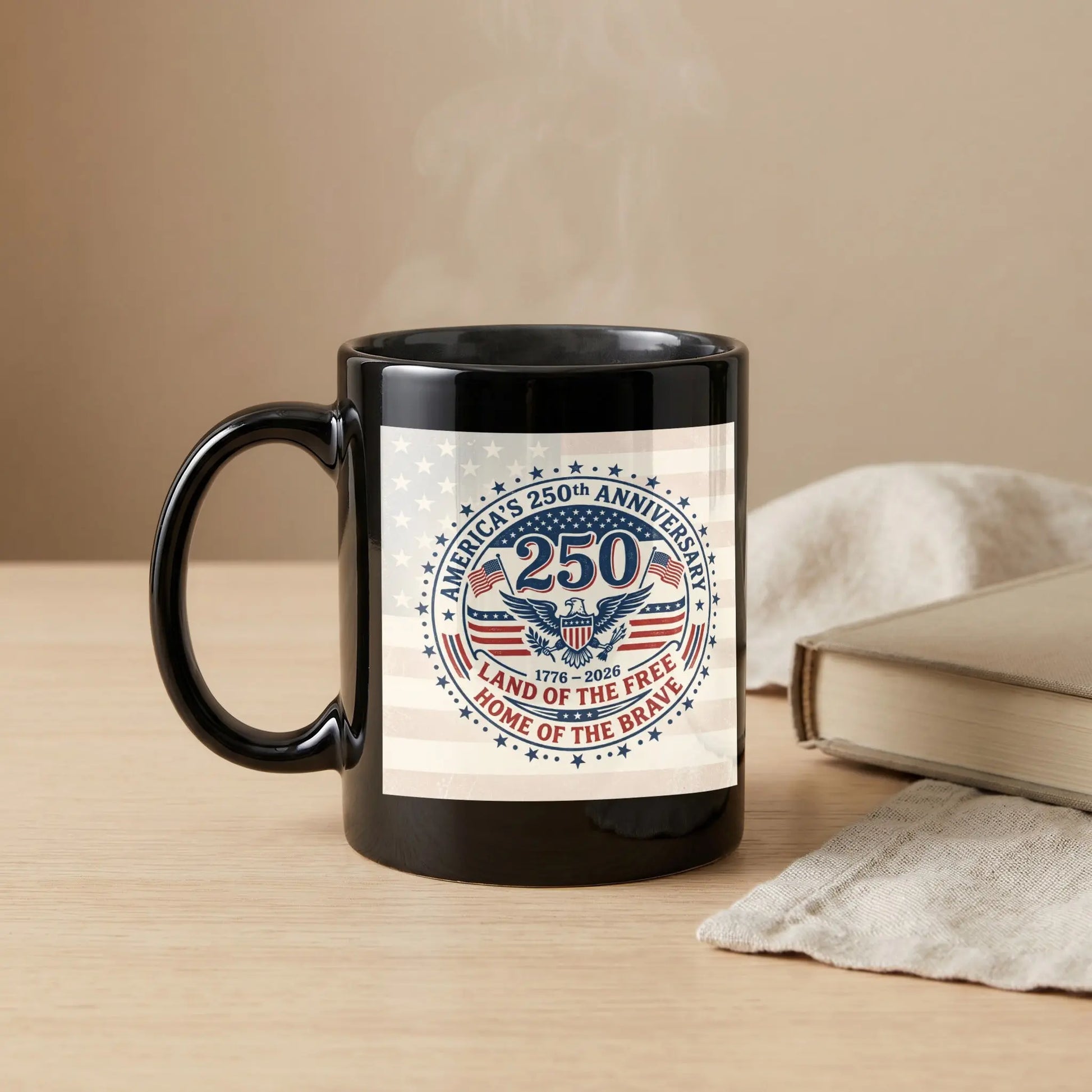 Black mug with America's 250th Anniversary design and steam rising.