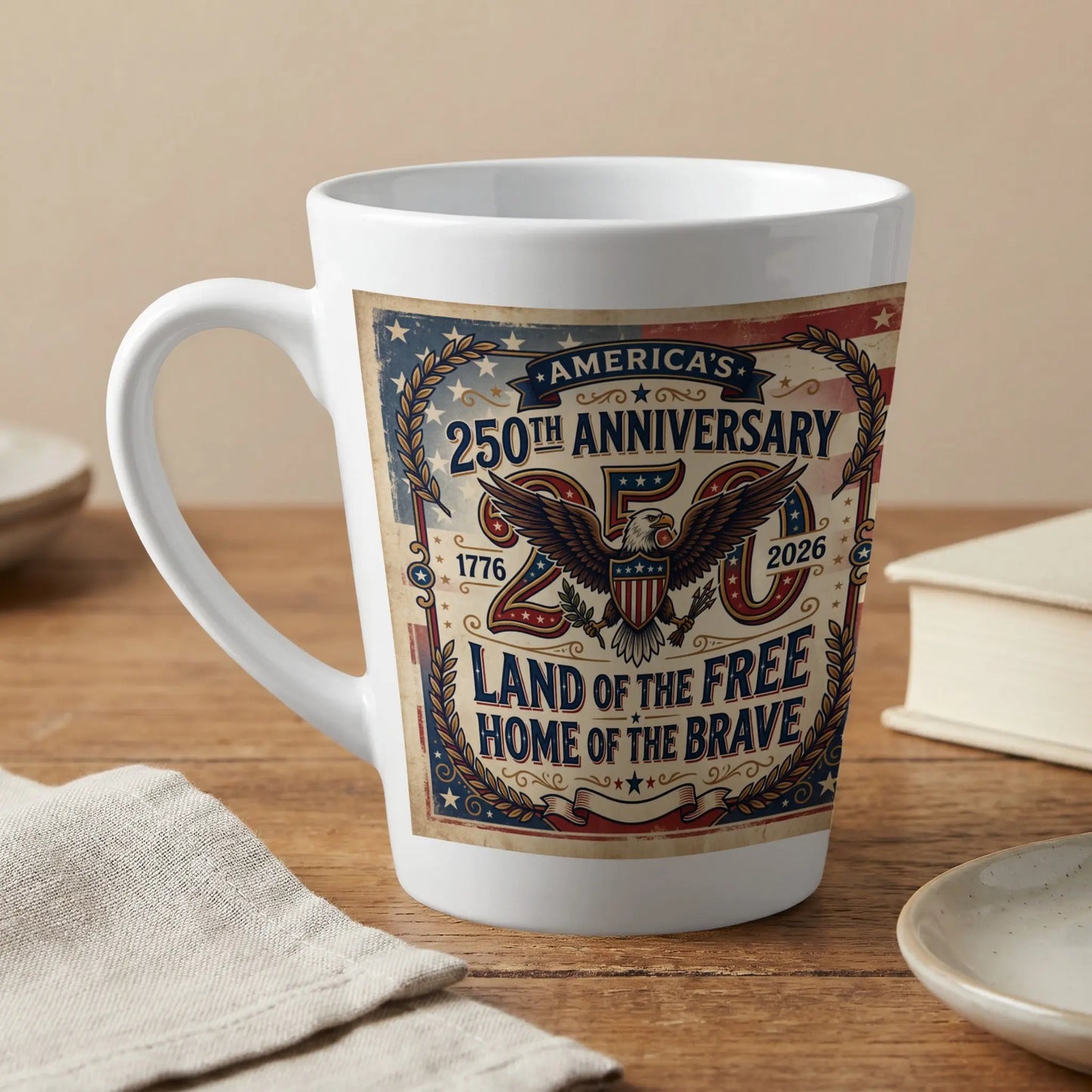 White mug with "America's 250th Anniversary 1776-2026 Land of the Free" text.