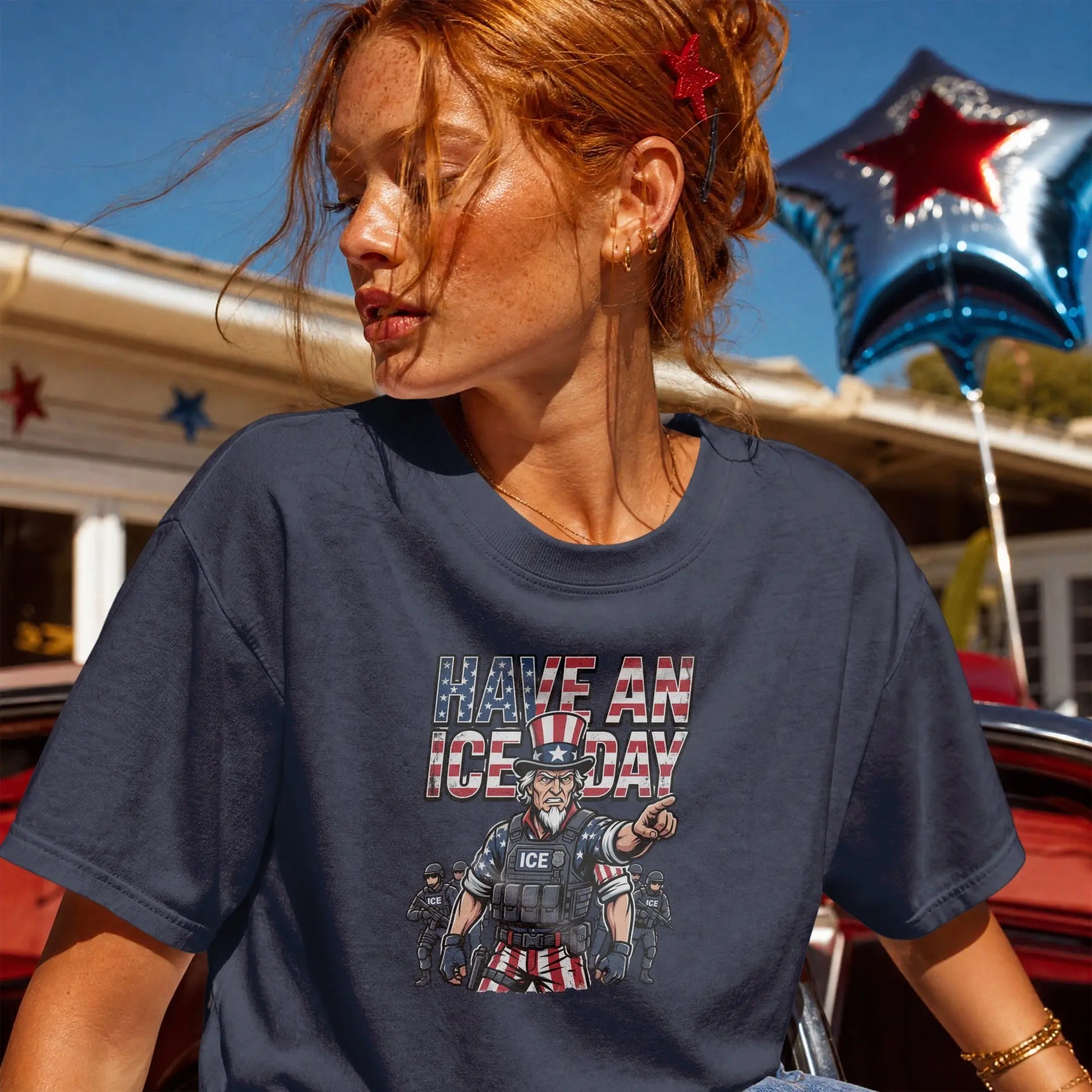 Dark blue t-shirt with patriotic graphic of Uncle Sam pointing and text "HAVE AN ICE DAY".