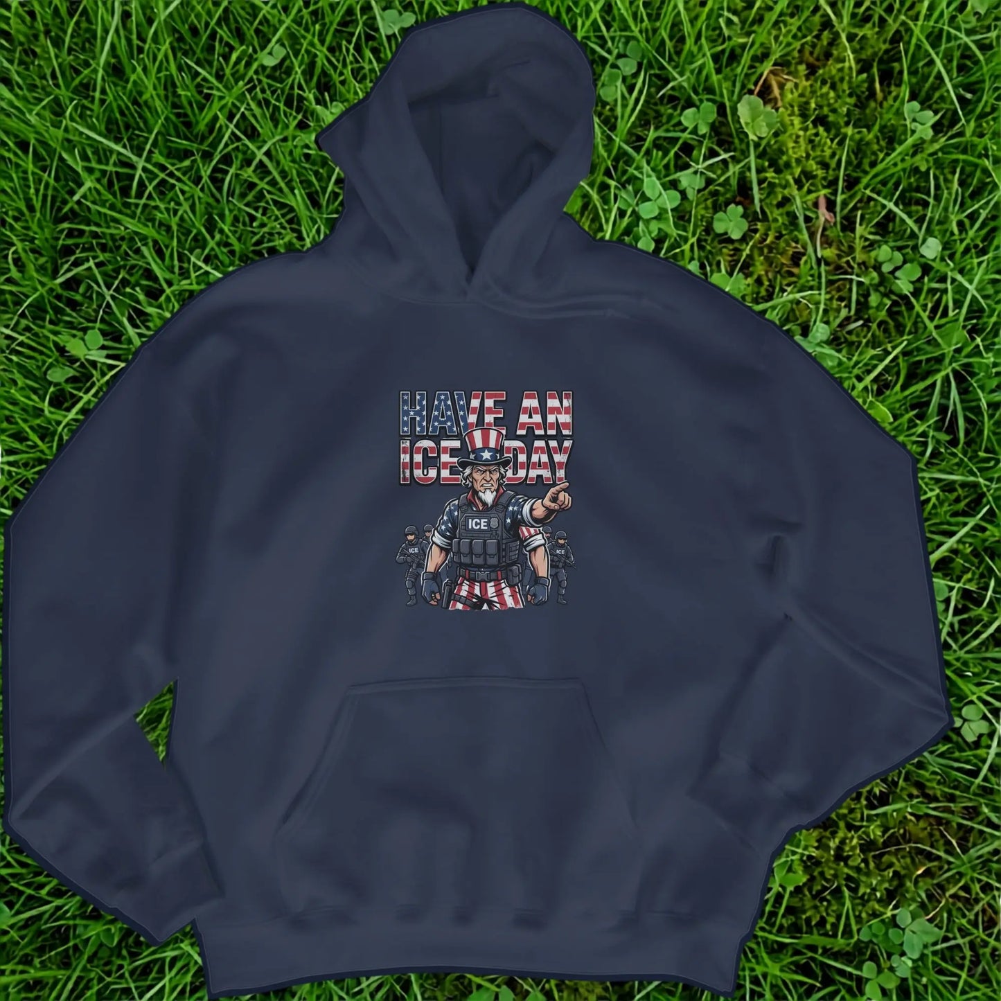 Dark blue hoodie with Uncle Sam, ICE officers, and "HAVE AN ICE DAY" text.