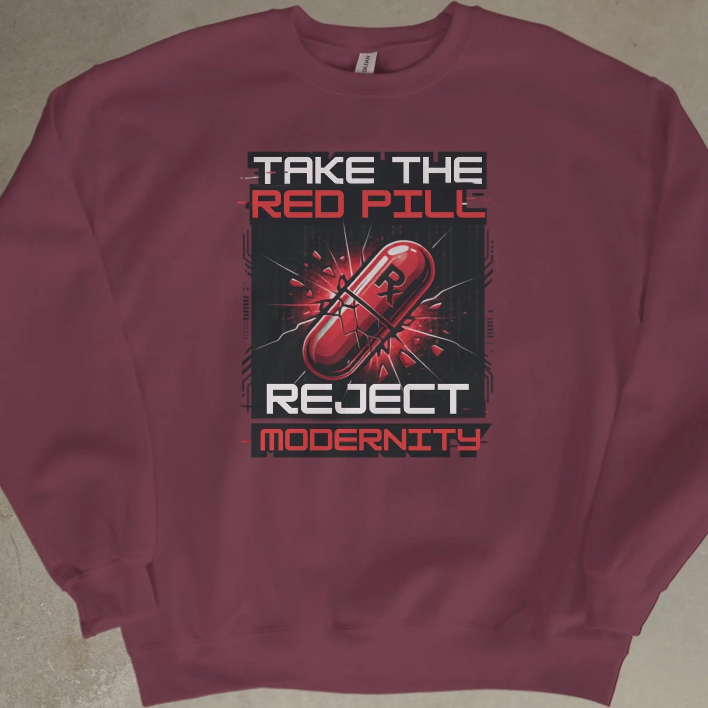 Maroon sweatshirt with graphic text "TAKE THE RED PILL REJECT MODERNITY" and a red pill.