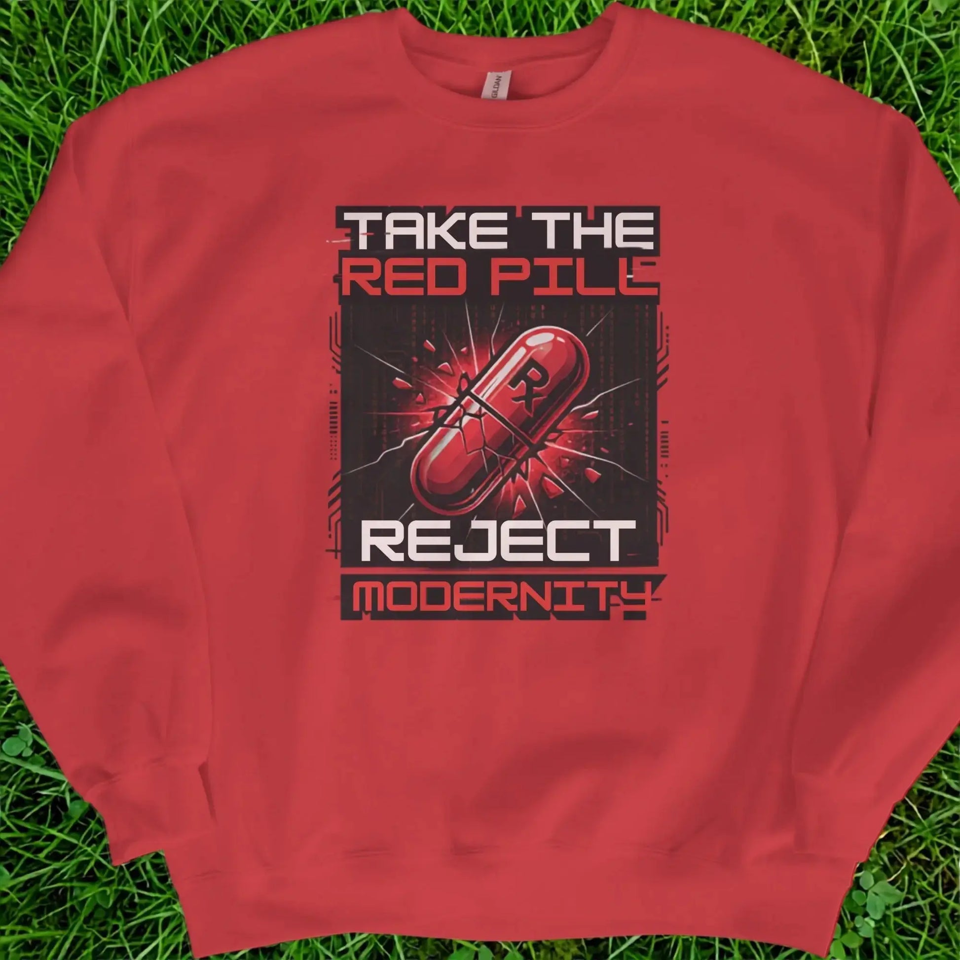 Red sweatshirt with "Take The Red Pill Reject Modernity" text and a cracked red capsule graphic.