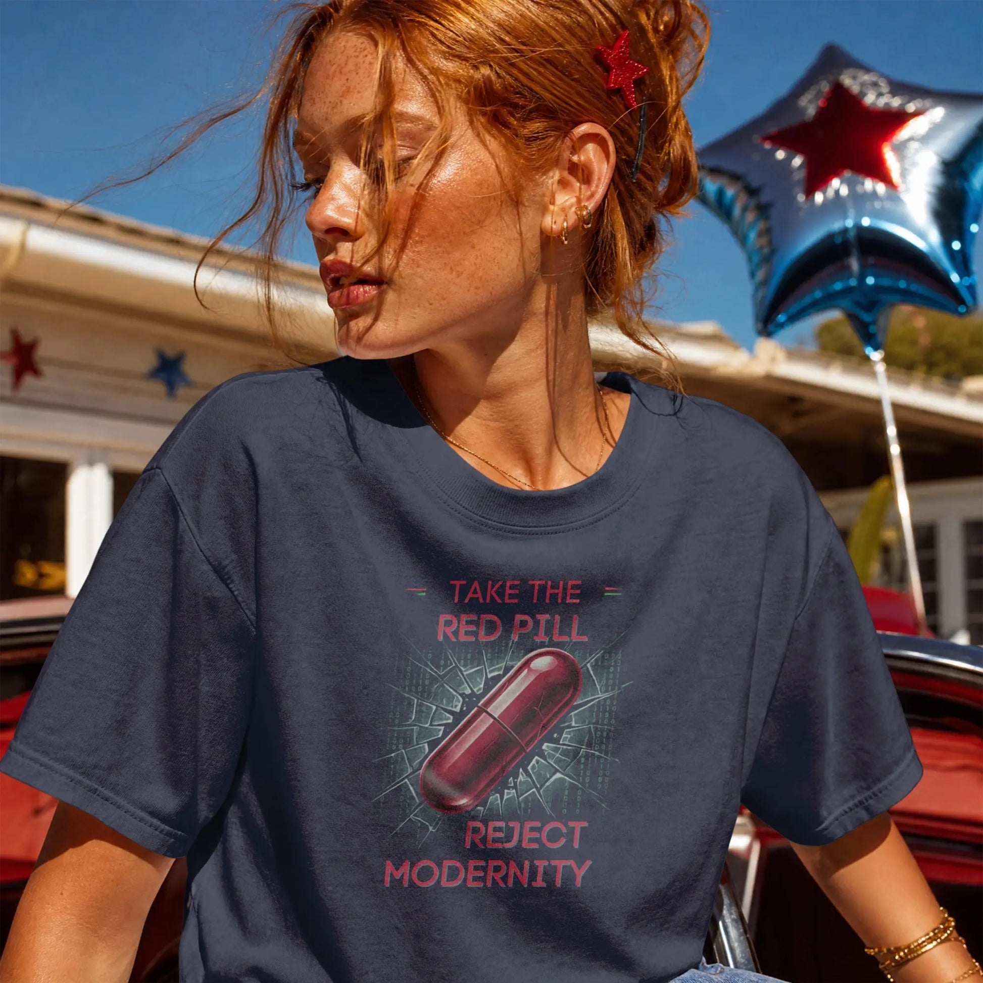 Navy t-shirt with red pill graphic, text "Take the Red Pill" and "Reject Modernity".