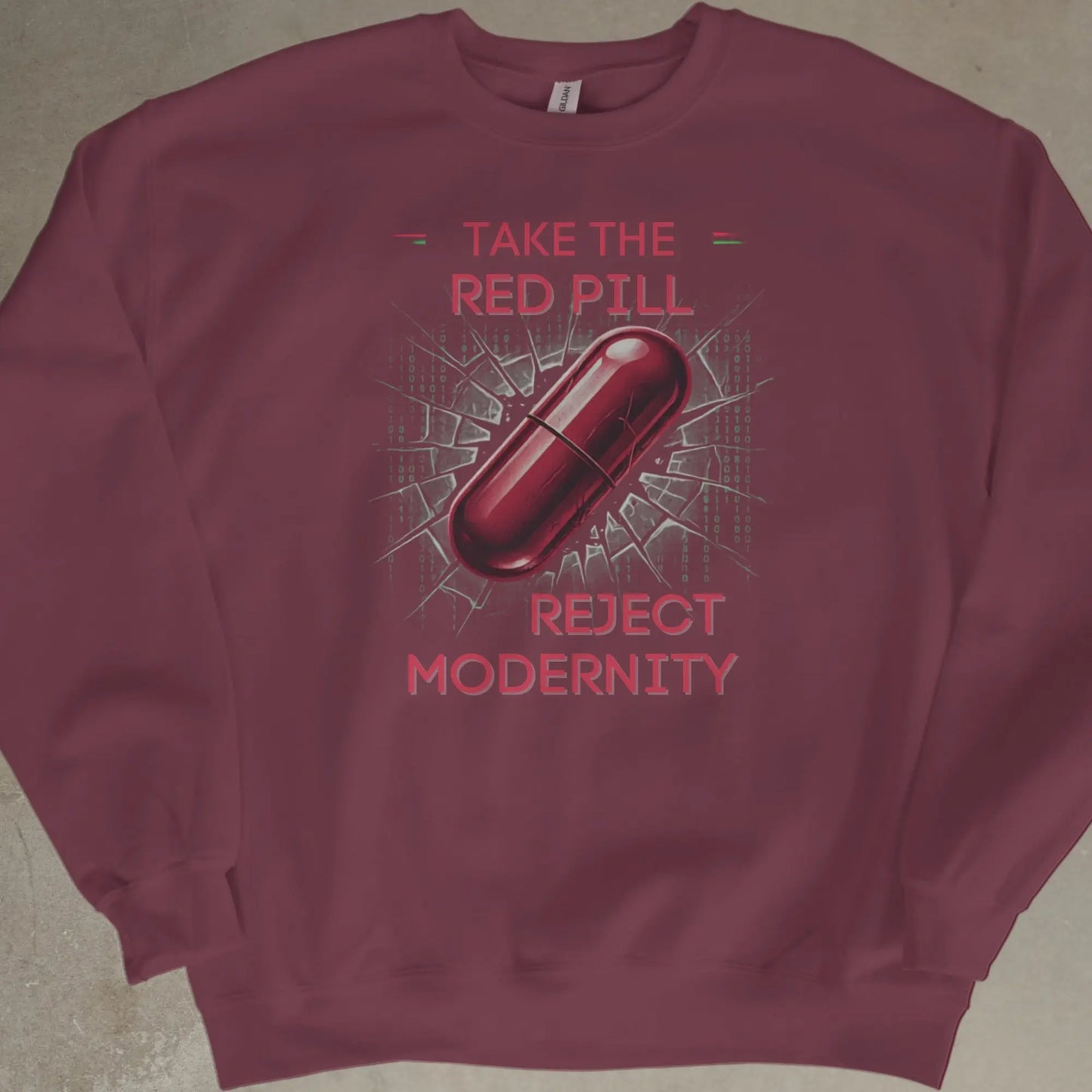 Maroon sweatshirt with red pill graphic and text "TAKE THE RED PILL REJECT MODERNITY".