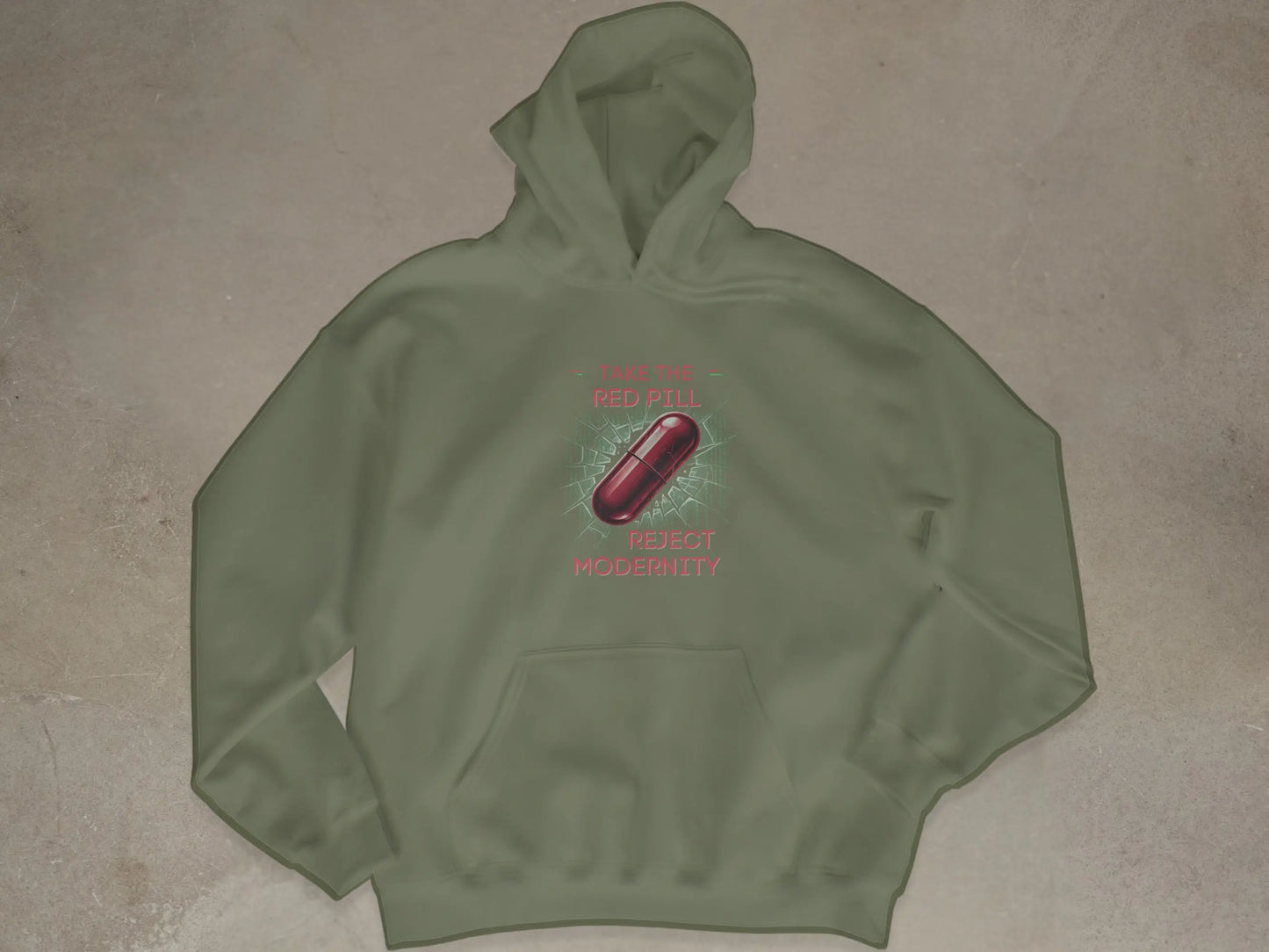 Sage green hoodie with a red pill design and text reading "TAKE THE RED PILL REJECT MODERNITY".