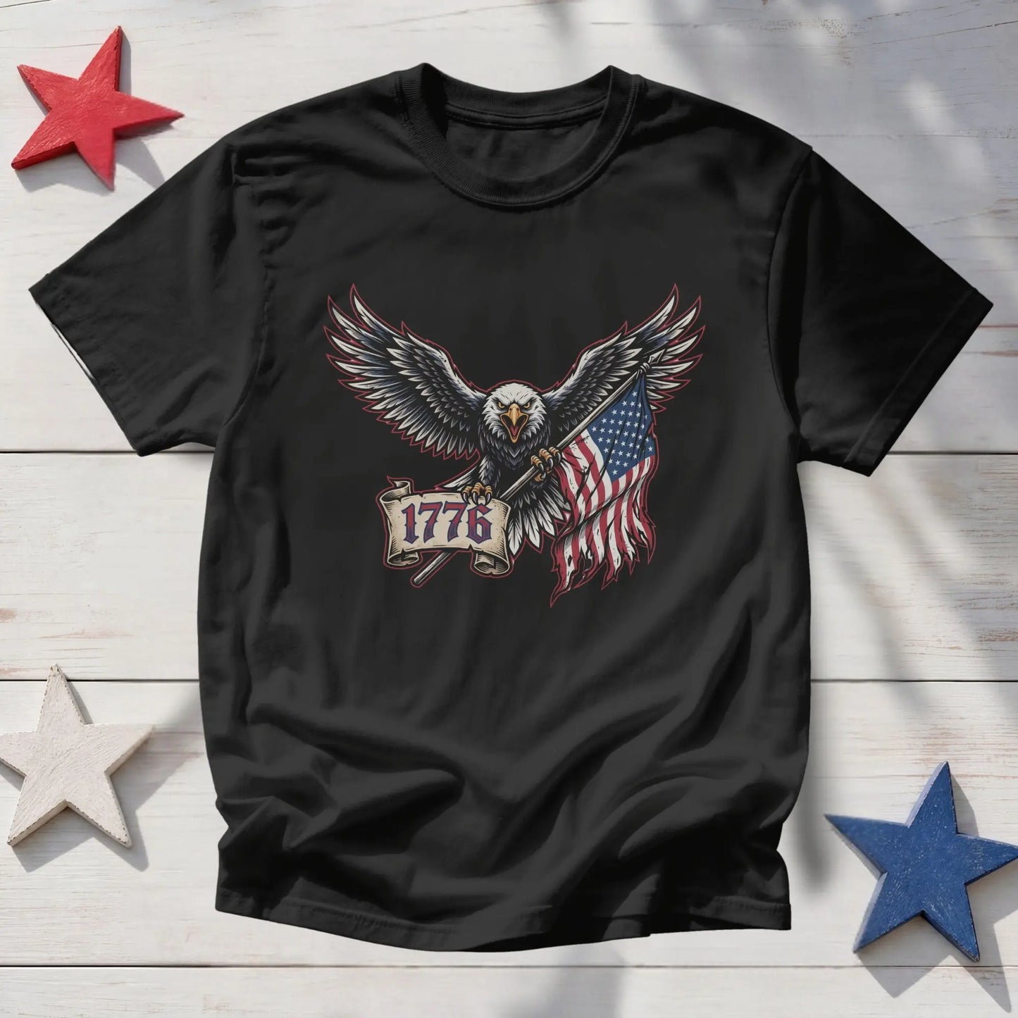 Black t-shirt with an eagle holding an American flag and banner reading "1776".