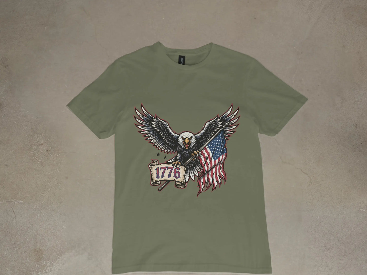 Eagle with American flag and "1776" banner on a green t-shirt.