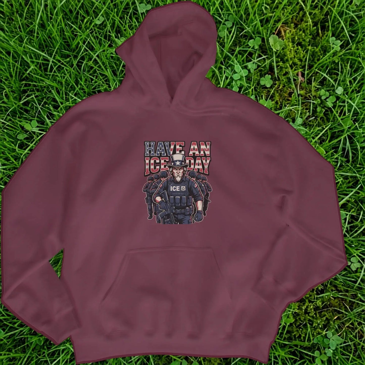 Maroon hoodie with "Have an ICE day" design featuring Uncle Sam and ICE officers.