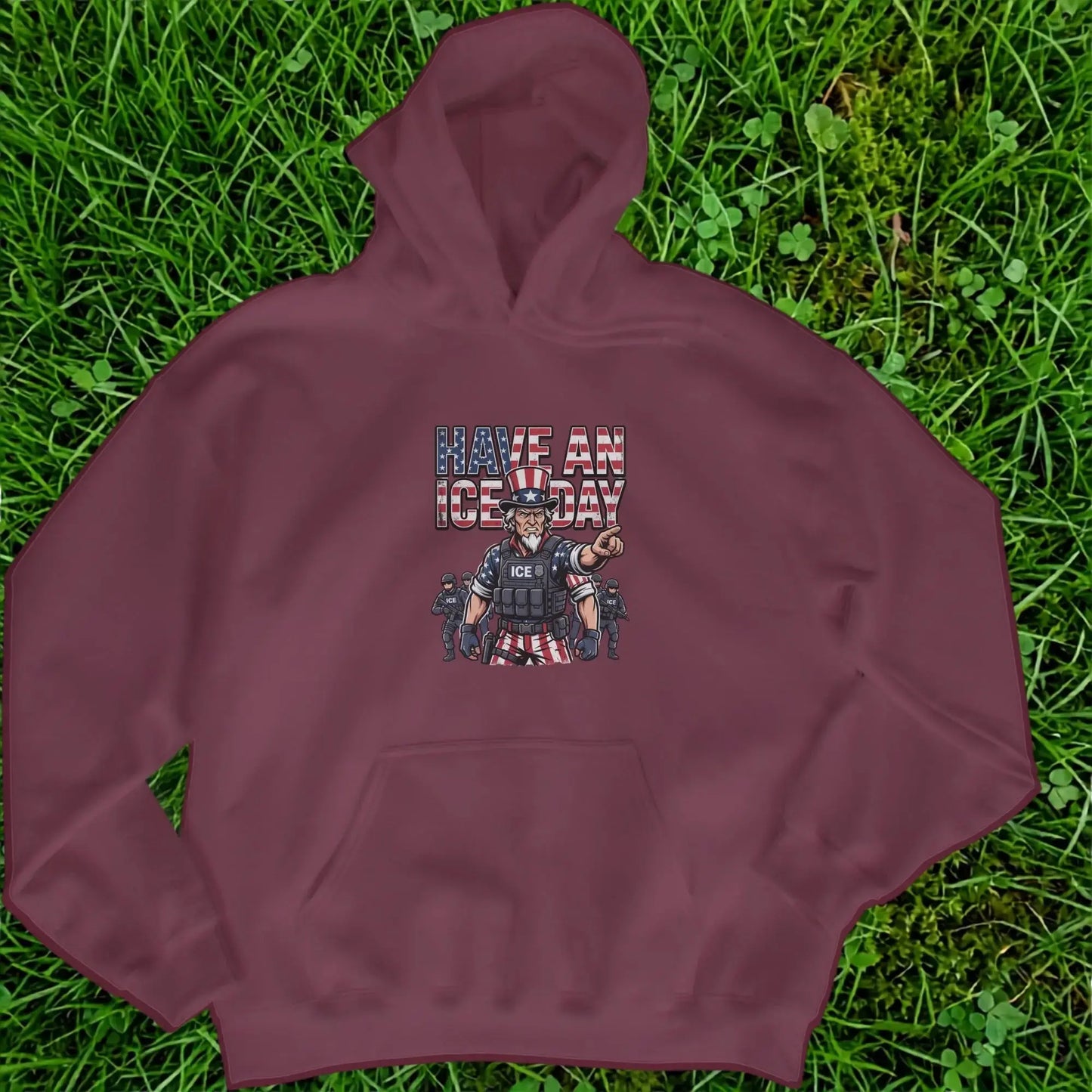 Maroon hoodie with illustration of Uncle Sam pointing and text "Have an ICE Day".