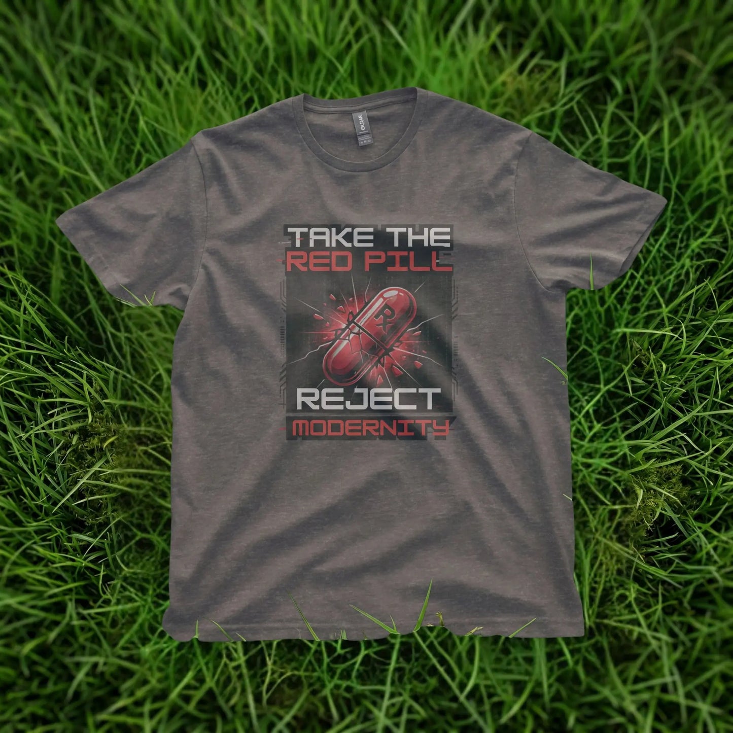 Dark grey t-shirt with "Take The Red Pill Reject Modernity" text and red capsule graphic.