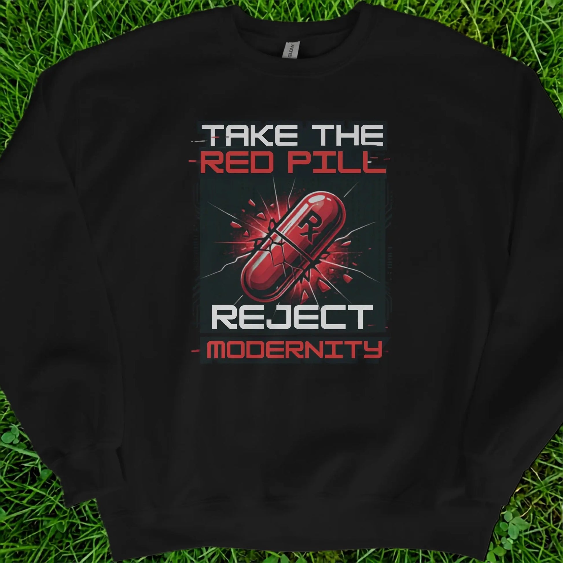 Black sweatshirt with text "TAKE THE RED PILL REJECT MODERNITY" and a cracked red pill.