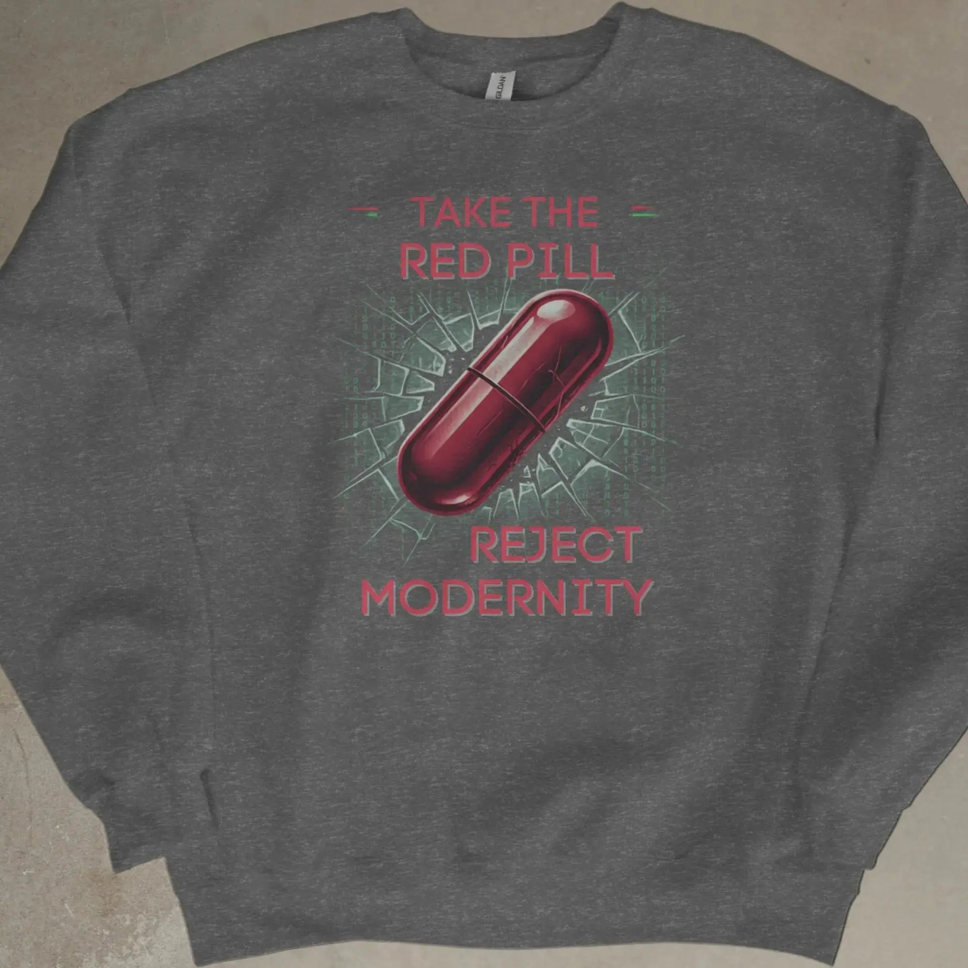 Dark gray sweatshirt with red text "TAKE THE RED PILL REJECT MODERNITY" and a pill graphic.