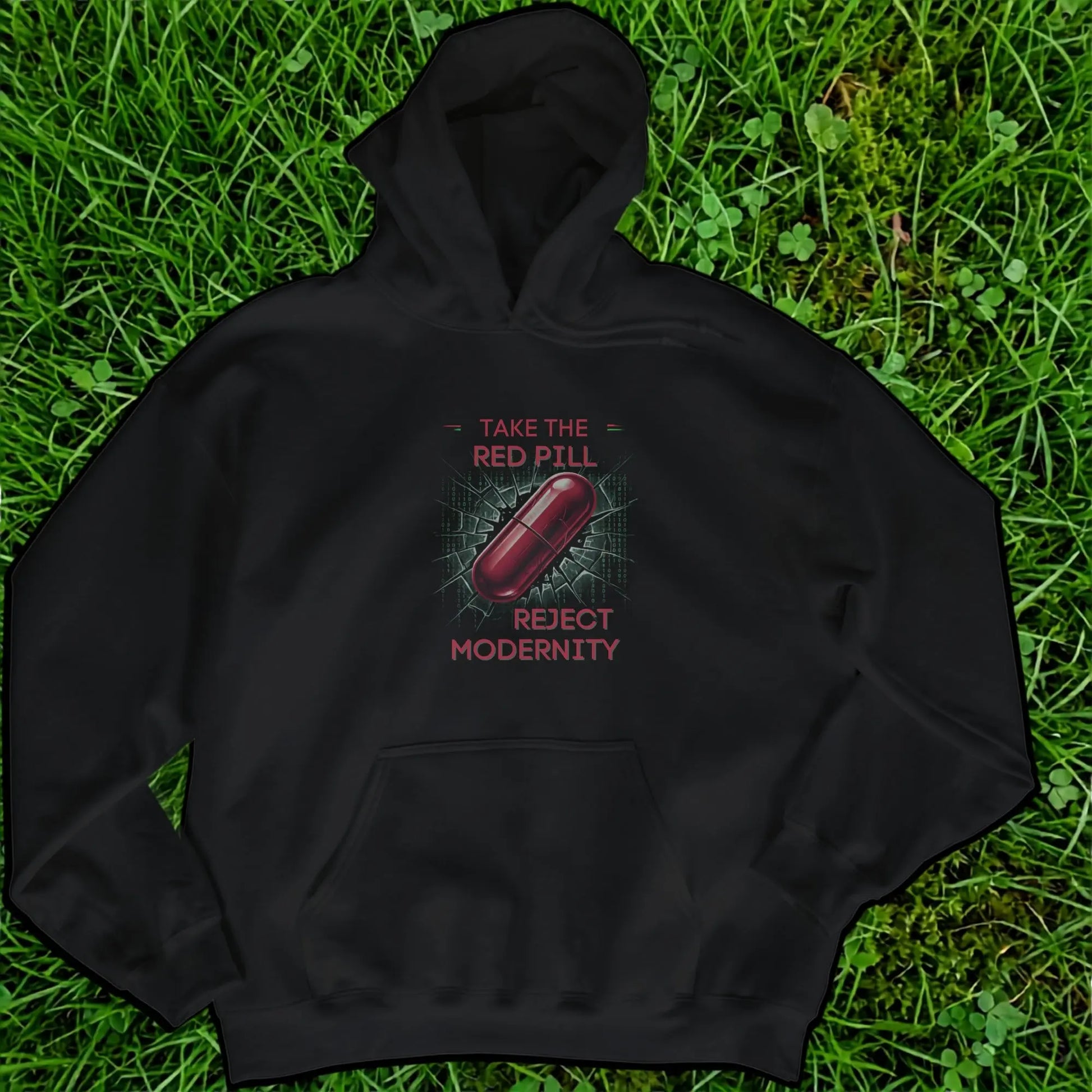 Black hoodie with a red pill and text "TAKE THE RED PILL REJECT MODERNITY".