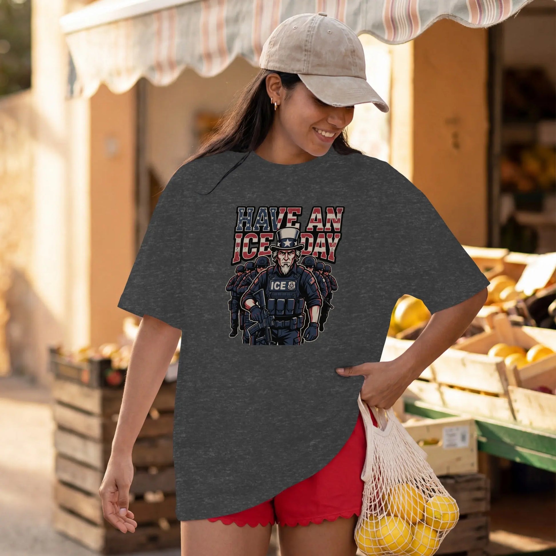 Graphic on t-shirt shows "HAVE AN ICE DAY" with patriotic flag and ICE agents.