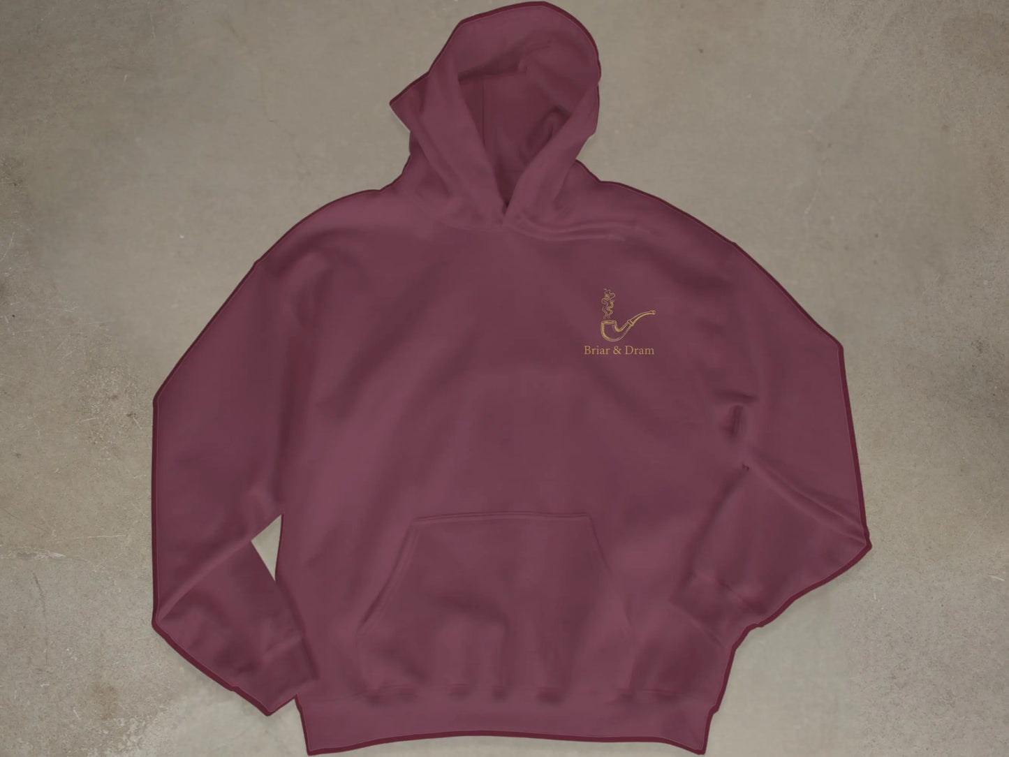 Maroon hooded sweatshirt with gold pipe and "Briar & Dram" text logo.