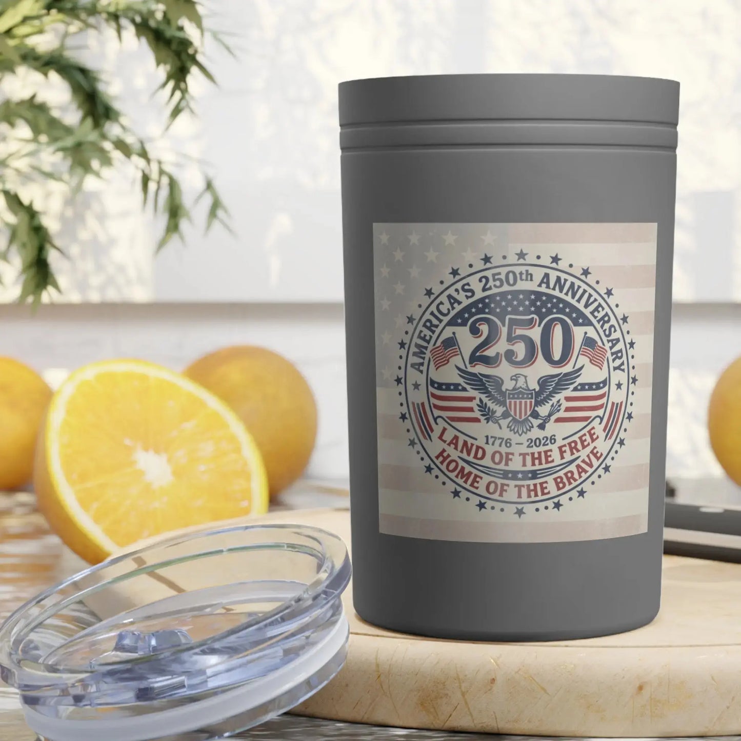 Gray tumbler with "America's 250th Anniversary" circular design featuring patriotic symbols.