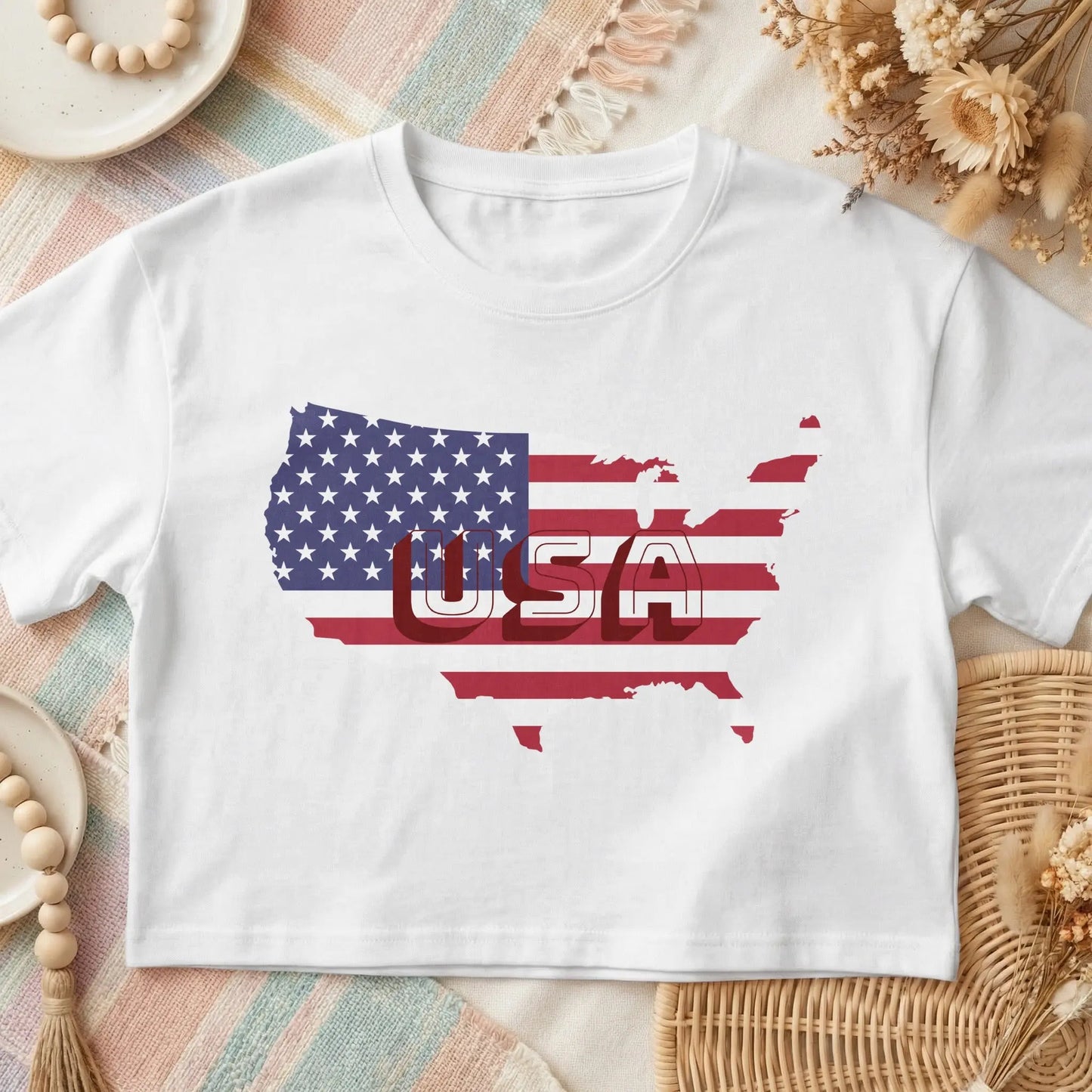 White t-shirt with USA map design featuring the American flag and text.