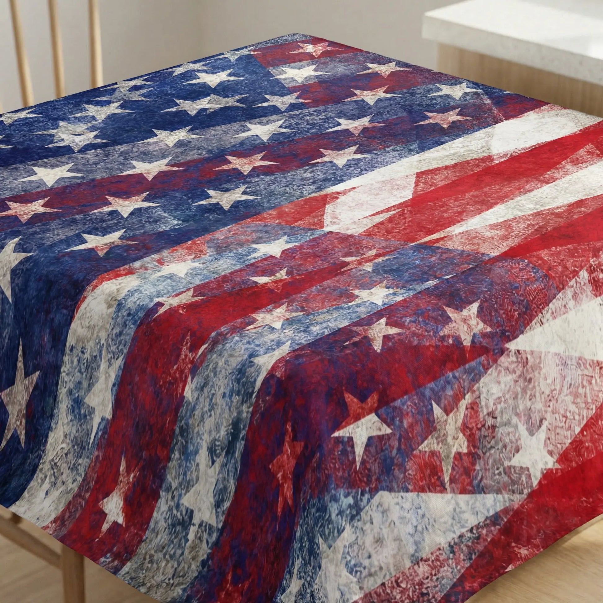 Tablecloth with distressed American flag pattern, including stars and stripes.