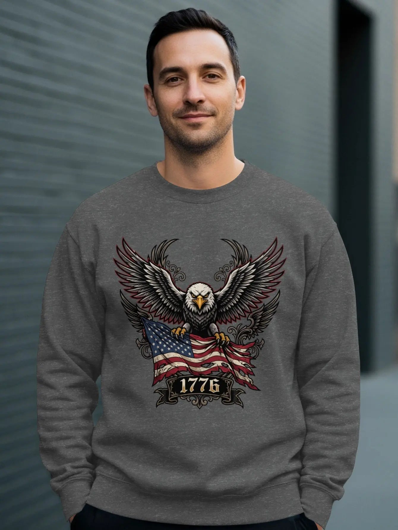 Grey crewneck sweatshirt with eagle graphic and "1776" text.