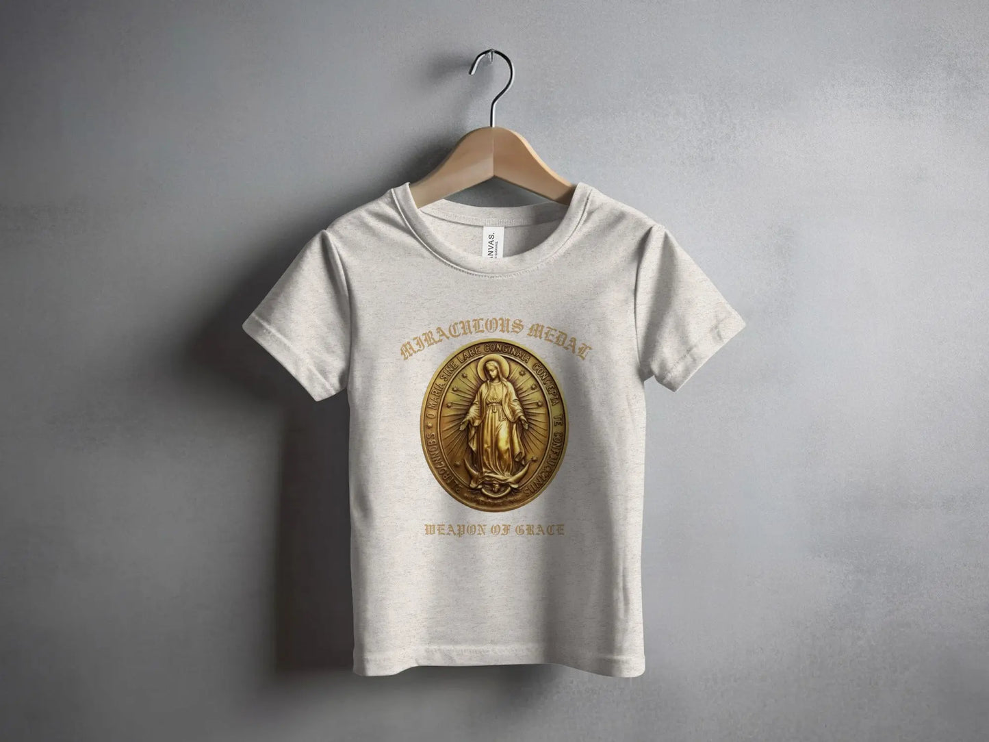 Light gray t-shirt with Miraculous Medal design and inspirational text.