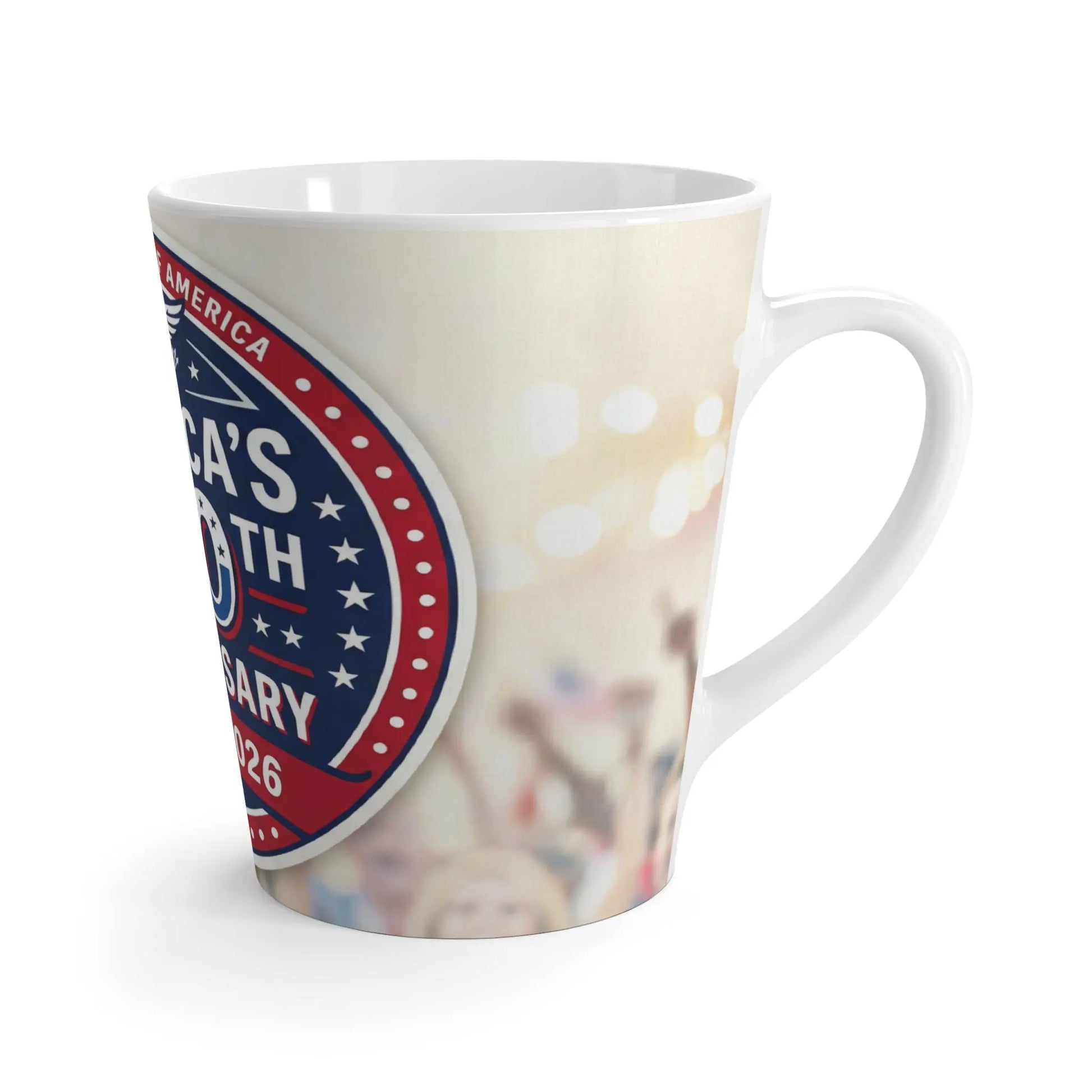 Latte mug with "America's 250th Anniversary 2026" emblem and blurred crowd background.