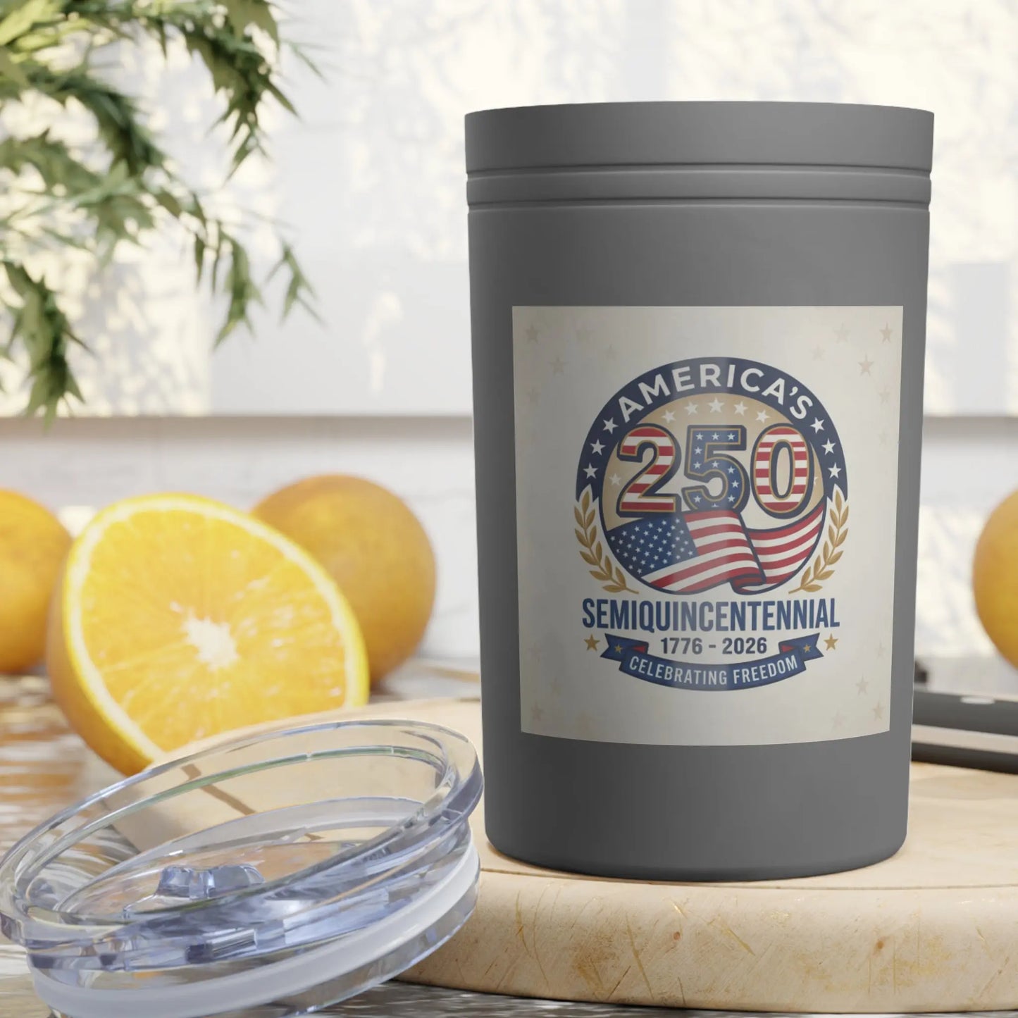 Gray tumbler with "America's 250 Semiquincentennial 1776-2026 Celebrating Freedom" label.