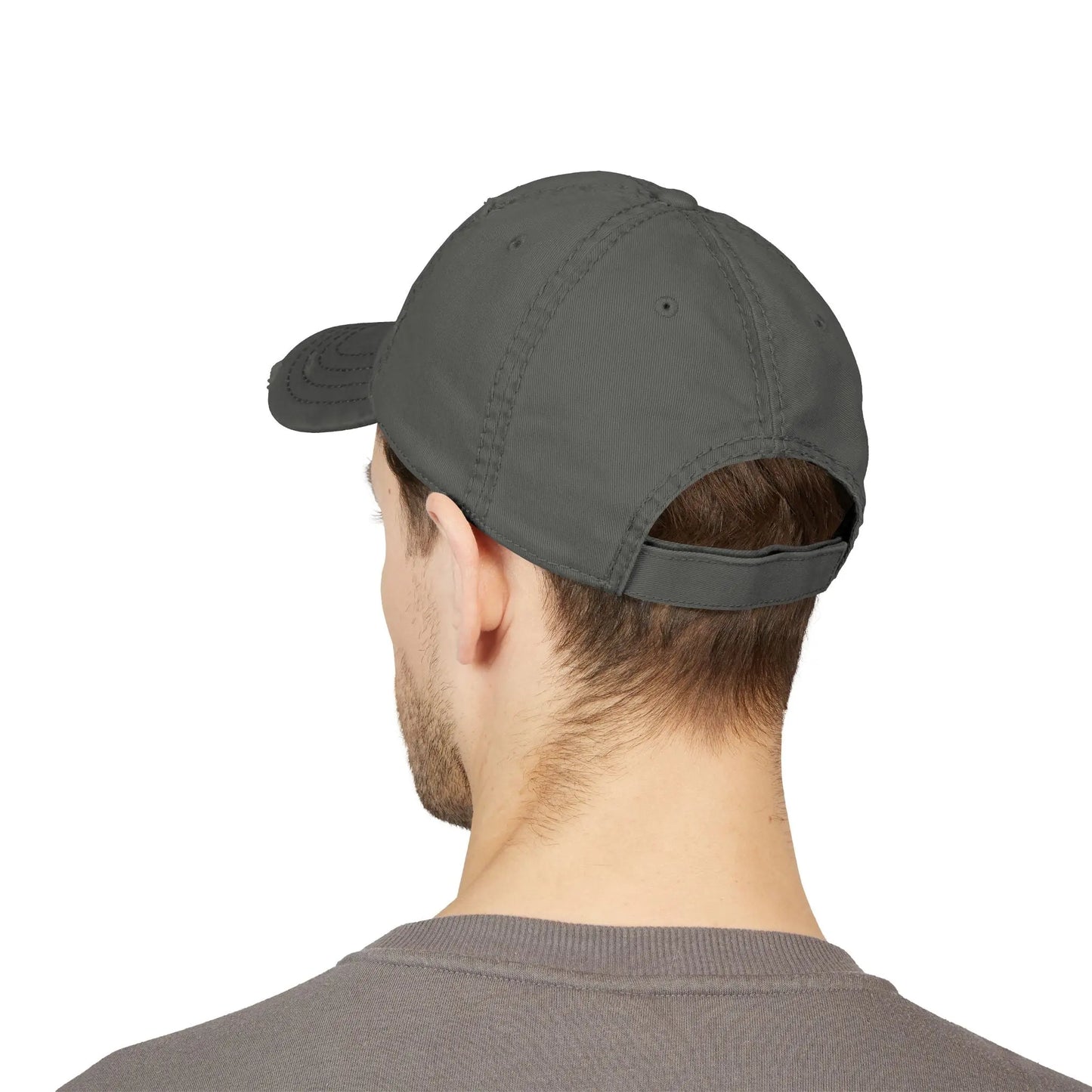 Back view of man wearing a plain dark gray baseball cap and gray t-shirt.