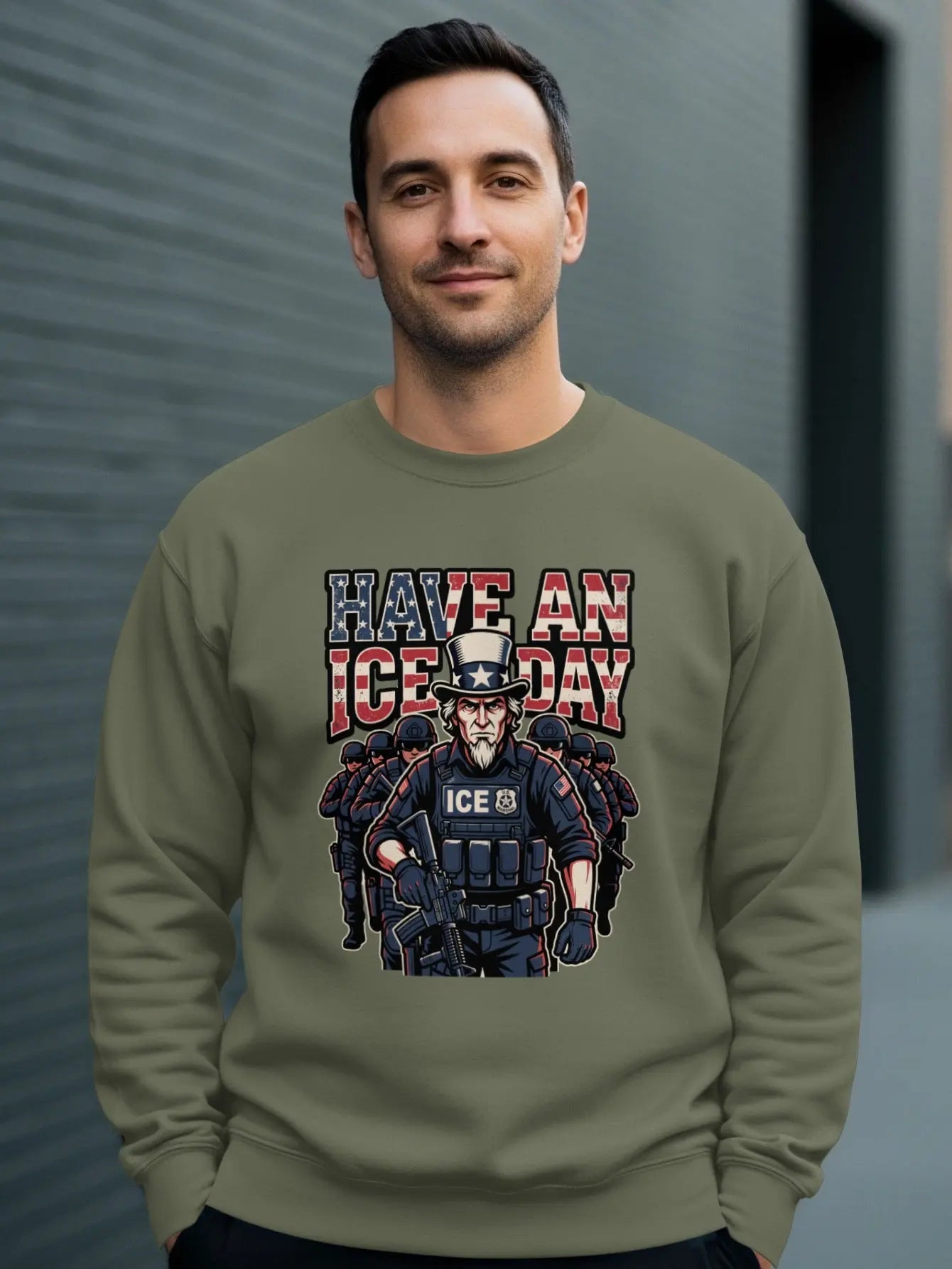 Man wearing olive sweatshirt with Uncle Sam and ICE agents graphic.