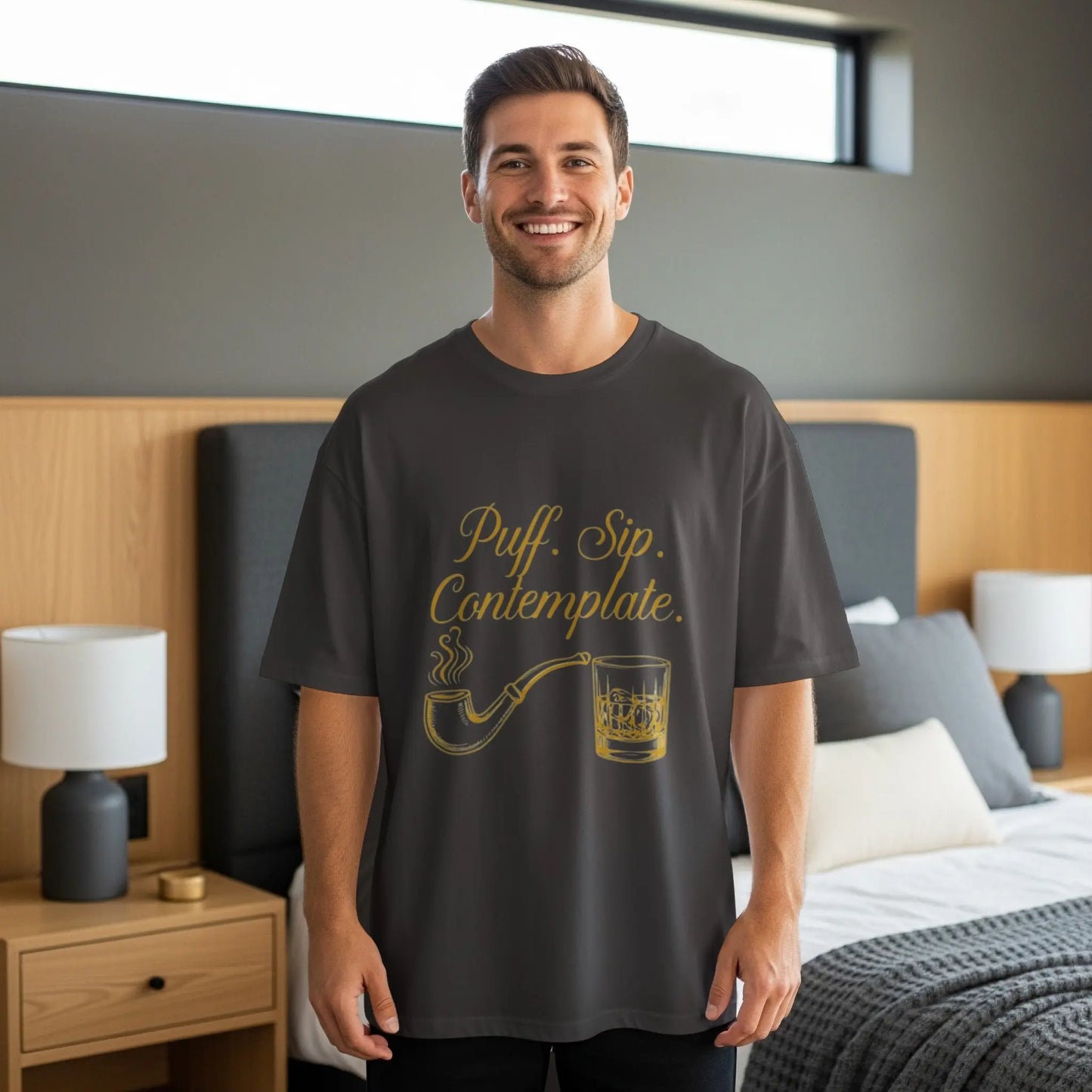 Dark grey t-shirt with "Puff. Sip. Contemplate." text and illustrations.